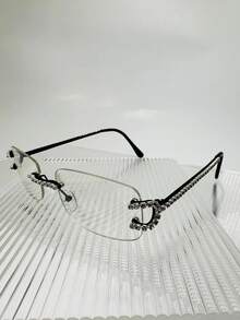 一副女士椭圆形椭圆形镜框，复古经典，80 年代末设计，奢华水钻装饰，金属无框设计，适合舞会装饰，眼镜，平面镜