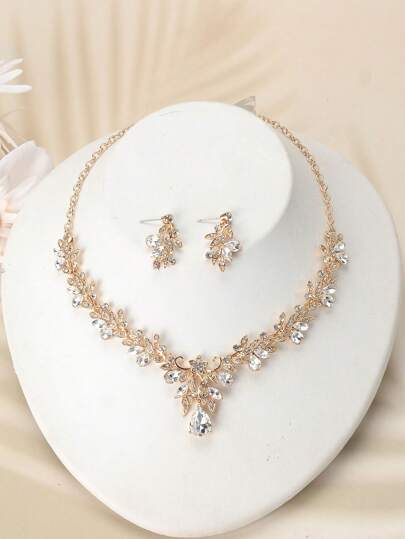 طقم قلادة وأقراط عصري مصنوعة من سبيكة بثلاث قطع ومزينة بأحجار الراينستون واللؤلؤ الاصطناعي، مناسبة لحفلات الزفاف والحفلات الأنيقة للسيدات مكونة من 3 قطع