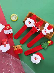 12入組聖誕毛絨拍拍手鐲,採用卡通聖誕老人、雪人、馴鹿和熊設計,適用於聖誕派對