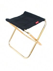 1張戶外摺疊椅,由鋁合金製成,適用於釣魚、燒烤、露營,攜帶方便且小巧