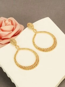 1對女性歐美時尚中空圓形耳環,大膽紋理設計
