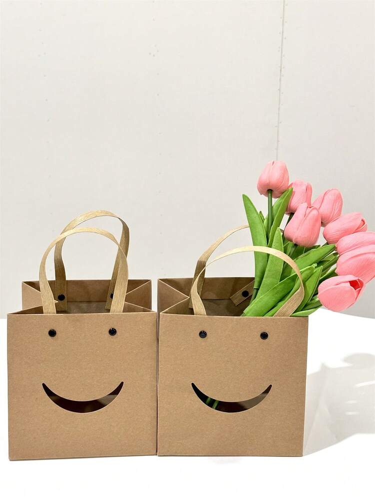 Sacchetti di carta kraft 250 pezzi con manici neri 32x17x25 cm | Leroy