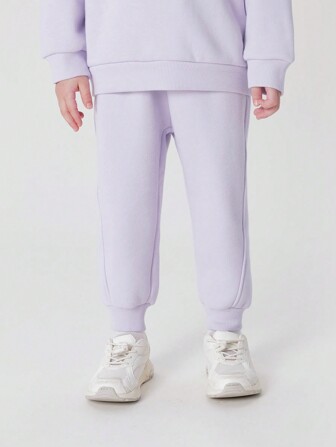 男女通用宽松保暖内衬运动裤，带弹性袖口，冬季