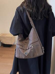 这是一款能满足您各种需求的女士手提包。适合秋冬季、大学生、通勤、校园风格背包、时尚复古女士手提包、纯色、可折叠、带金属装饰、容量大、便携、多隔层、女士单肩包、百搭单肩包、休闲女士经典背包、可调节肩带女士购物袋、适合商务/通勤/节日/度假/约会礼物的手提包 - 咖啡棕 - 查看 4