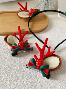 3入組聖誕主題髮飾套裝,包括馴鹿鹿角頭箍、髮夾和蕈型髮夾,適用於節日打扮