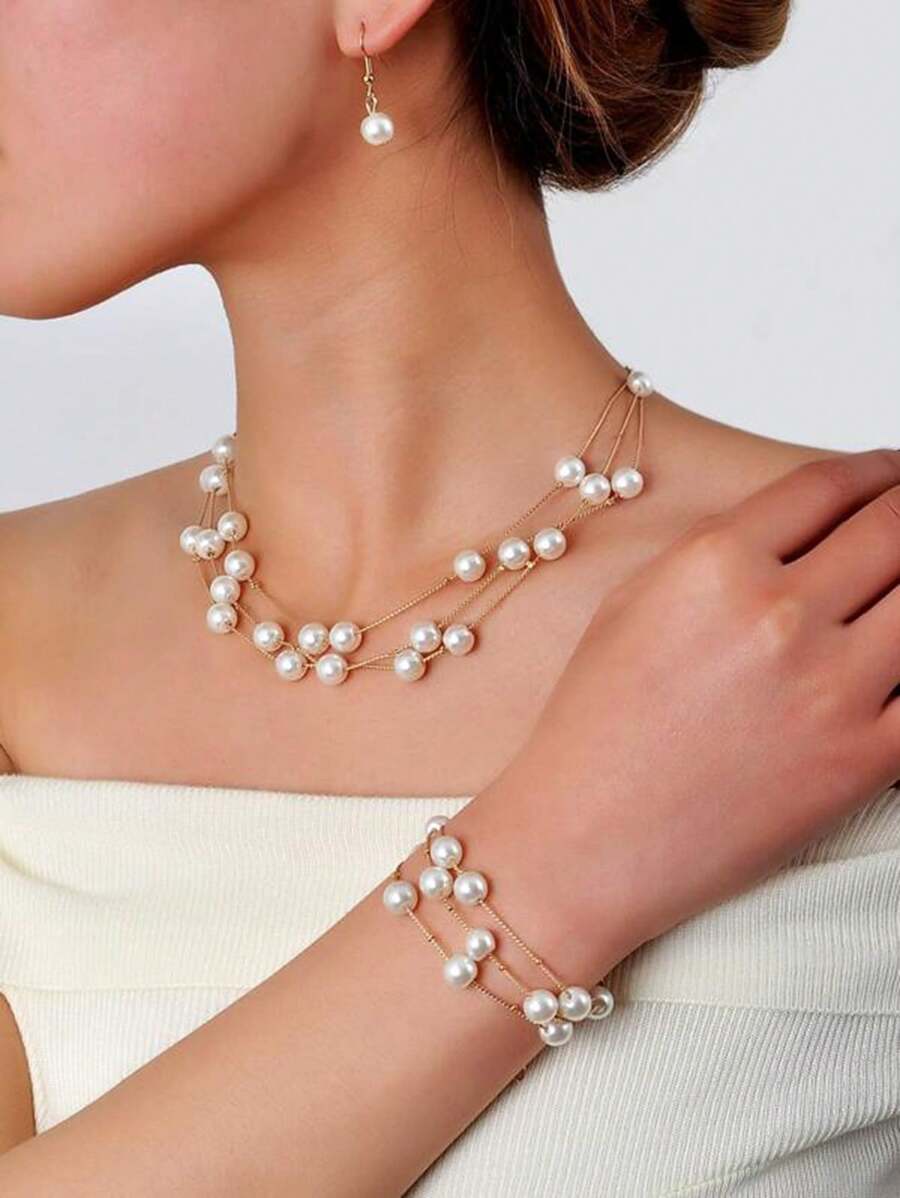 時尚、甜美、優雅的珍珠多層項鍊、耳環和手鐲一套，適合女士的婚禮穿著，共三件套 - 金色 - 查看 1