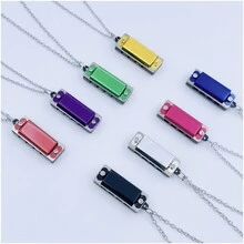 1個含4個口琴孔和8種音調的迷你項鍊口琴,初學者音樂玩具,適合小學生,幼稚園禮品批發