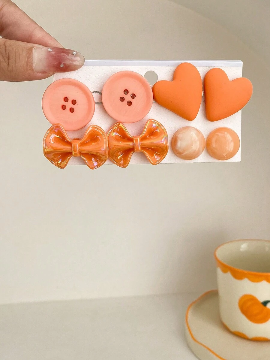 1 套 4 對 歐美流行橙色蝴蝶結和噴漆斜心形耳環適合女士日常佩戴