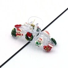 1款聖誕節女性髮夾,帶有雪人、聖誕老人、聖誕樹和馴鹿等元素的聖誕節樹裝飾,髮夾