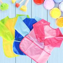 1件藍色兒童藝術罩衫,適用於繪畫、diy和用餐,帶有長袖