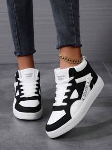 女款黑白休閒高筒運動鞋,秋冬季舒適透氣設計,綁帶式閉合