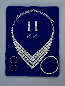 8入組銀色高貴的鑽石和寶石點綴的婚禮珠寶套裝,包括項鍊,手鍊,耳環和戒指,完美適用於婚禮和派對皇室風格