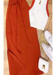 高腰中長裙套裝,帶開岔,與ribana短衣共用,為您帶來時尚感。 - 亮橙色 - 查看 1