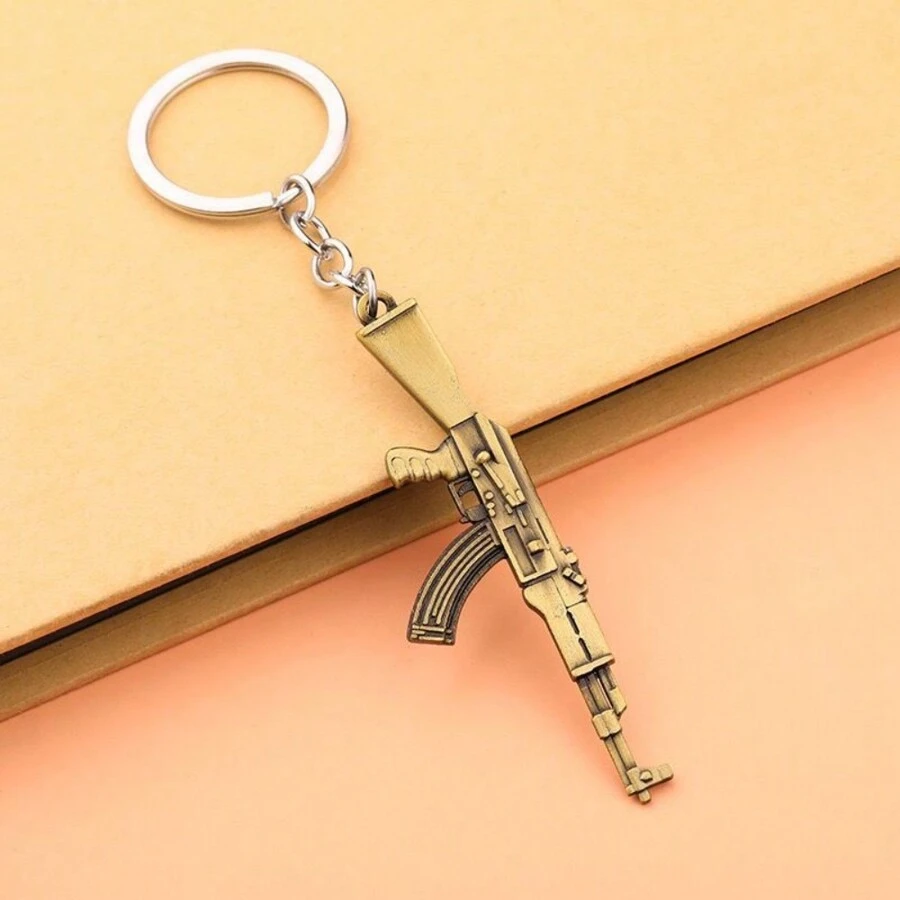 一件古銅色遊戲沖鋒槍ak47武器模型鑰匙扣掛件合金鑰匙扣鑰匙鏈感恩節禮物,聖誕節禮物,送朋友、家人、男、女朋友、同事禮物、回饋禮物、宾客禮物、派對禮物,新年禮物,新年派對汽車鑰匙鏈包錢包包配件單肩包斜挎包手提包手提包派對節日禮物,生日,情人節,時尚,時尚,時尚,青少年女孩,女大學生,教師 - 銅色 - 查看 1