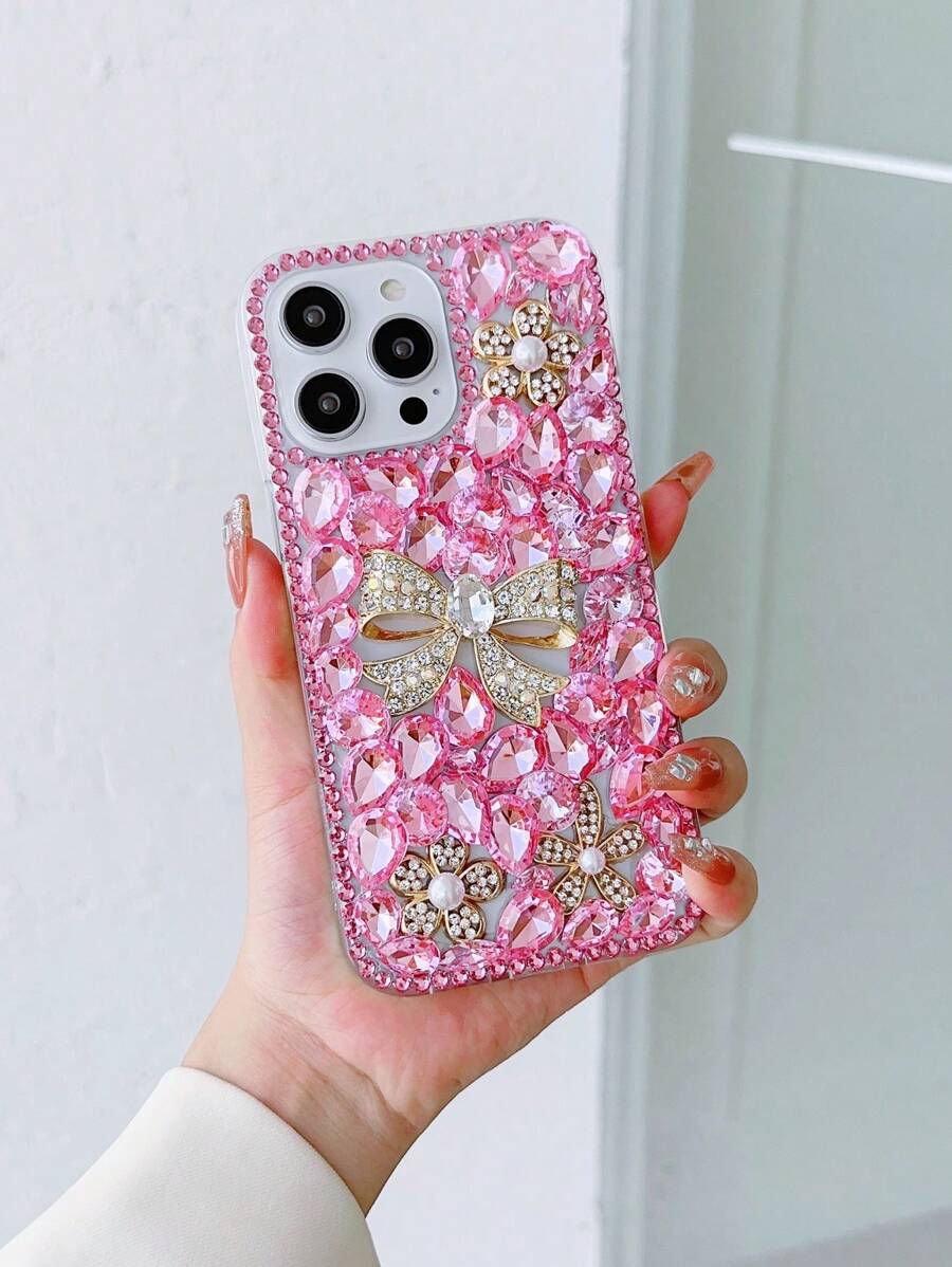 Funda de teléfono con elemento de lazo rosa, decoración de rhinestone a la moda, compatible con iPhone, resistente al agua, a los golpes, a las caídas y a los arañazos, primaveral