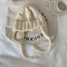 1頂女士時尚復古針織飛行員帽,帶有耳保暖毛圈和粉紅色帶裝飾,適用於冬季