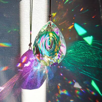 Multi-sized Dragon Eye Prism Crystals Hang From Chandeliers Or Windows To Create A Rainbow Of Crystal Pendants