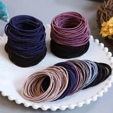 200入組5cm尼龍彈性髮帶,適用於女孩細髮綁成馬尾辮等髮型,是頭飾配件之一