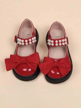 女童珍珠蝴蝶结装饰闪亮时尚公主玛丽珍平底鞋，可爱百搭，请查看尺码表以确保合脚。