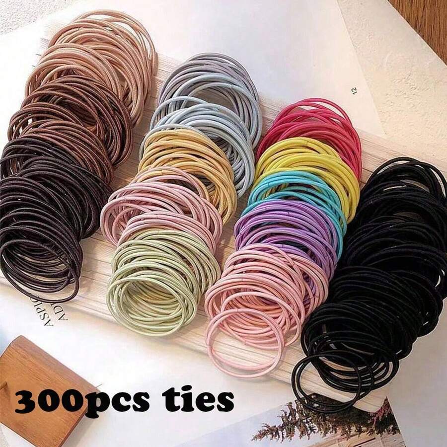 200入組5cm尼龍彈性髮帶,適用於女孩細髮綁成馬尾辮等髮型,是頭飾配件之一