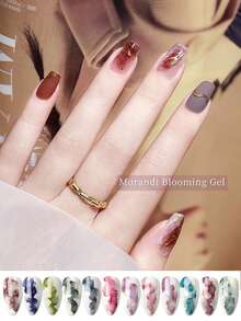 1瓶15ml Morandi風格盛放凝膠007,由abs樹脂製成,賦予你的指甲獨特的暈染藝術,包括漸變色彩、水彩和煙霧效果,增強你美甲的藝術吸引力,改善暈染效果,確保指甲持久耐磨。其使暈染更加容易,適用於個人美甲工作室和家居使用,讓您輕鬆創造morandi風格的指甲藝術。適合個人美甲工作室和家居使用,創造morandi風格的指甲藝術。 - 紫羅蘭色 - 查看 4