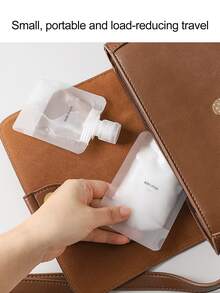 5pcs 50ml Portable Pet Material Travel Size Refillable Squeeze Pouch For Liquid Toiletries, Reusable. 30ml/50ml/100ml Refillable Flip-Top & Stand-Up Spout Liquid Pouch, Easy To Fill And Dispense, Compact Size For Lightweight Traveling - Clear - View 6