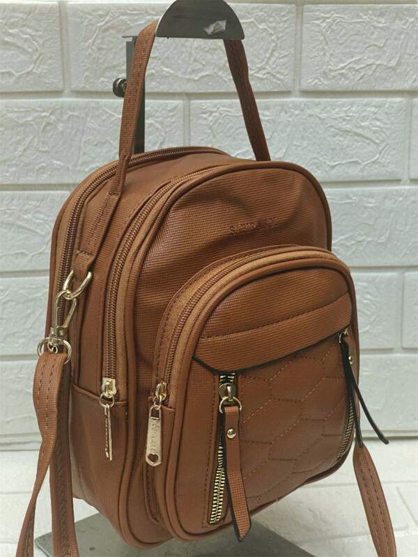 Mochila escolar pequena de couro brilhante