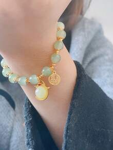 1條2024年龍年生肖手鍊,有餃子和龍的裝飾,仿綠色寶石珠子,適合女性日常佩戴或新年節日儀式 - 993- 餃子龍綠珠子款 - 查看 7