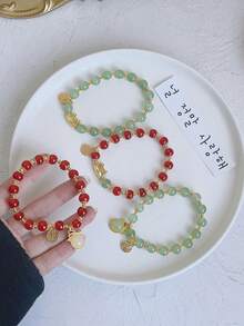 1條2024年龍年生肖手鍊,有餃子和龍的裝飾,仿綠色寶石珠子,適合女性日常佩戴或新年節日儀式 - 993- 餃子龍綠珠子款 - 查看 1