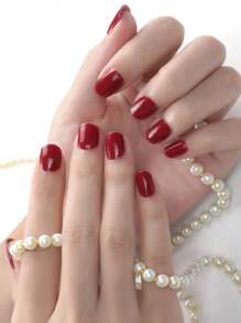 哇!這款酒紅色美甲在白皙的皮膚上看起來棒極了! 16 件裝簡單純色橢圓形假指甲,帶有 Uv 半成品凝膠,便攜、耐用,非常適合聚會、工作、旅行和拍照 - 紅色 - 查看 2