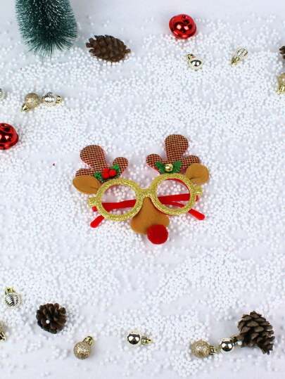 LENTES NAVIDEÑOS DE PLÀSTICO ROJO. ARMAZÓN FRONTAL CON BRILLITOS ROJOS, DECORADOS COMO RENO CON CUERNOS, OREJAS Y NARÍZ. TAMAÑO ESTÁNDAR