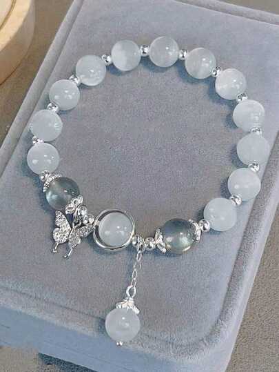1 pulsera de  de cristales con diseño de mariposa y estrella en tono gris luna, perfecta para mejor amiga