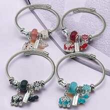 1個女士時尚合金和不銹鋼手鍊,有大象吊墜,可調式,適合日常佩戴 - 紅色 - 查看 2