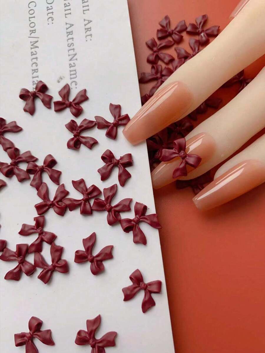1 包 50 个蝴蝶结设计美甲装饰，DIY 欧式和北美流行风格，日韩可爱甜美风格指甲饰品，树脂美甲沙龙指甲饰美甲用品指甲宝石 - 酒紅色 - 查看 1