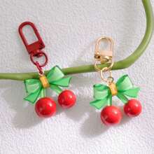 1個可愛的紅色櫻桃吊飾鑰匙扣,綠色蝴蝶結裝飾,可用作女孩的耳機盒或包配件 - 多色 - 查看 4
