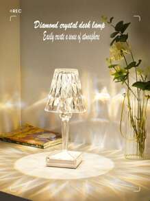 觸摸式水晶桌燈,搭配白色橢圓形亞克力材質燈罩,高約25cm(約9.84in),直徑約11cm(約4.33in),配備遙控器、觸摸式、可調節亮度和色溫。 它由內置的2000 Mah電池供電,還有一個usb充電口。 充滿電後,可持續照明10小時以上 - RGB16色充電款 - 查看 4