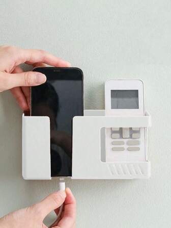 1pc White Plastic Wall-Mounted Shelf With Phone Holder, Remote Control Holder And Charging Hole