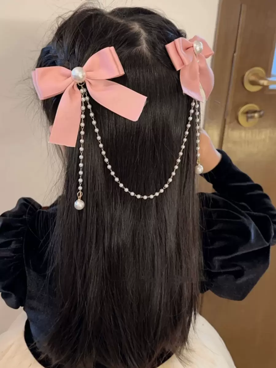 1 件女孩时尚甜美珍珠蝴蝶结和流苏发夹，由于面料批次不同，略有色差是正常现象，请参考包装卡和实际产品。随机珍珠数量 - 粉色 - 查看 1