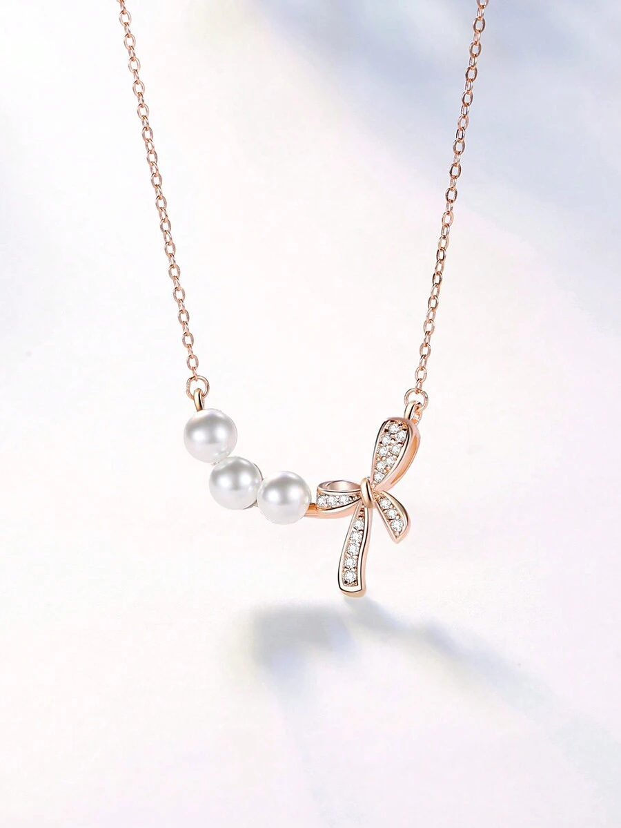 1件优雅奢华的925银仿珍珠和立方氧化锆装饰蝴蝶结项链，可作为送给女性的礼物，日常佩戴，生日、派对、约会皆宜 - 蝴蝶結 - 查看 1