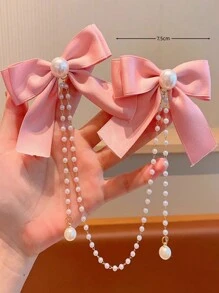 1 件女孩时尚甜美珍珠蝴蝶结和流苏发夹，由于面料批次不同，略有色差是正常现象，请参考包装卡和实际产品。随机珍珠数量 - 粉色 - 查看 4