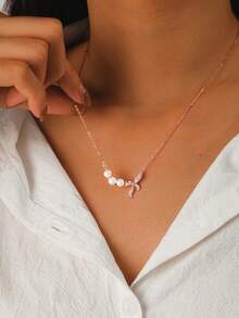 1件优雅奢华的925银仿珍珠和立方氧化锆装饰蝴蝶结项链，可作为送给女性的礼物，日常佩戴，生日、派对、约会皆宜 - 蝴蝶結 - 查看 4