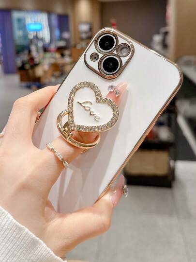 电镀金属可折叠旋转立方氧化锆心形手机壳适用于 11、 13、 14、 14 Pro、 14 Plus、 14 Pro Max、 15、 15 Pro、 15 Pro Max、 16、 16 Pro、 16 Plus、 16 Pro Max 防水防震防摔防刮