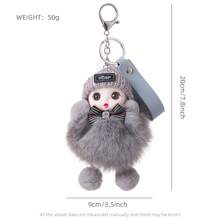 1隻毛茸茸可愛的毛絨娃娃,柔軟舒適,配有鑰匙扣,可掛在家裡或旅行背包上,有7種顏色可選,是送給女孩子的完美禮物 - 棕色 - 查看 2