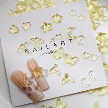 隨機混合100入組黃色星星、月亮、蝴蝶結、蝴蝶、美人魚尾巴指甲藝術裝飾,適用於diy手機殼、鞋子、服裝 - 黃色 - 查看 2