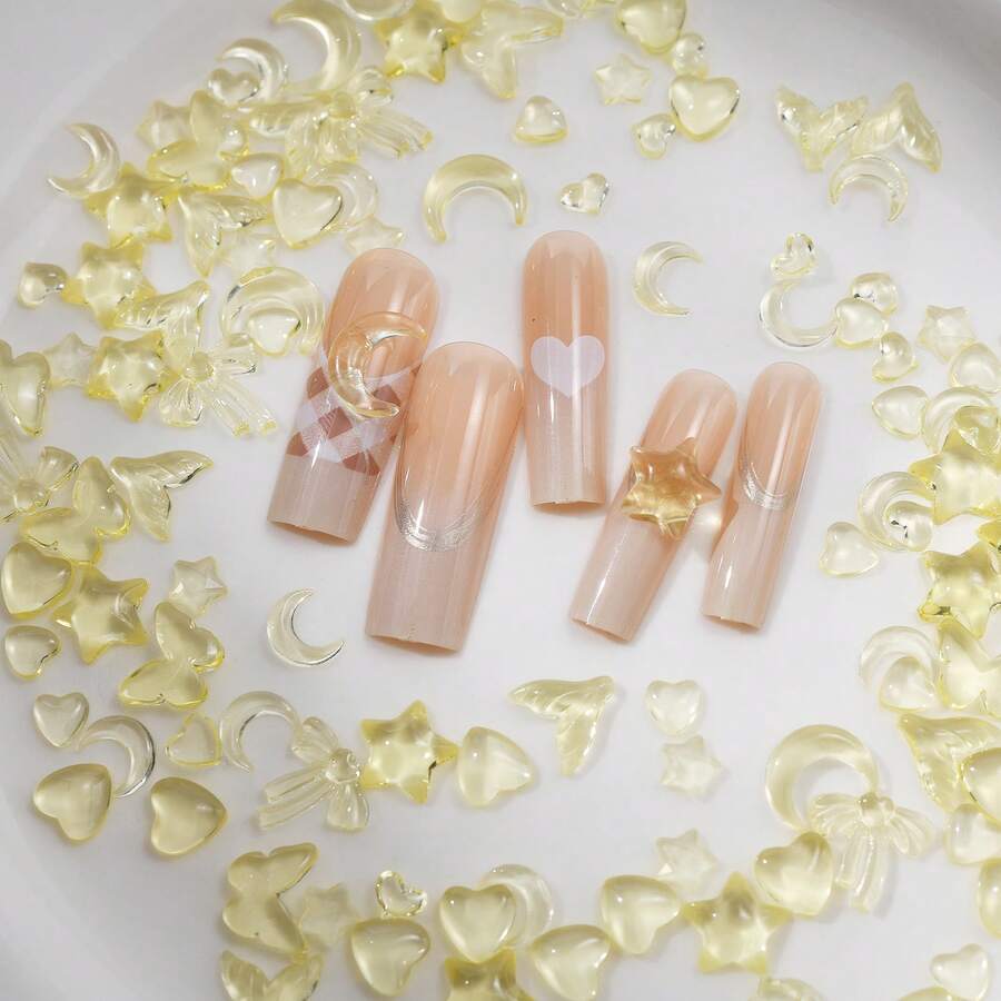 隨機混合100入組黃色星星、月亮、蝴蝶結、蝴蝶、美人魚尾巴指甲藝術裝飾,適用於diy手機殼、鞋子、服裝 - 黃色 - 查看 1