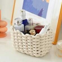 1只白色編織存儲籃,可用於放置桌上的鑰匙、宿舍雜物、化妝面膜、衛生紙、客廳咖啡桌上,以及家庭工作儲物。