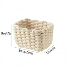 1只白色編織存儲籃,可用於放置桌上的鑰匙、宿舍雜物、化妝面膜、衛生紙、客廳咖啡桌上,以及家庭工作儲物。