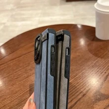 A Khaki Suede Leather Strap With An Extendable Wrist Strap Holder And A Drop-Resistant Phone Case With Perforated Camera Protection For The Iphone - Khaki - View 9