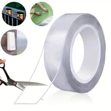 1捲耐用納米膠帶,採用強韌材料製成,承重2.2磅,不會在表面上留下殘留物或損壞,可水洗和重複使用。透明設計使其隱形,不會影響您的物品或表面的外觀。適用於家庭、辦公室或汽車使用。 - 透明無痕奈米雙面膠*3.28英尺 - 查看 6