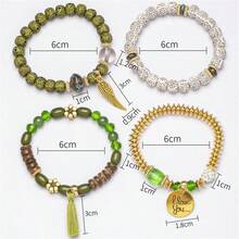 [4pcs/Set] Fashionable Bohemian Elastic Multiple-Layer Charm Bracelet Set With Gold-Color English Letter Plate, Wing & Tassel Pendant, And Beads - Multicolor - View 9